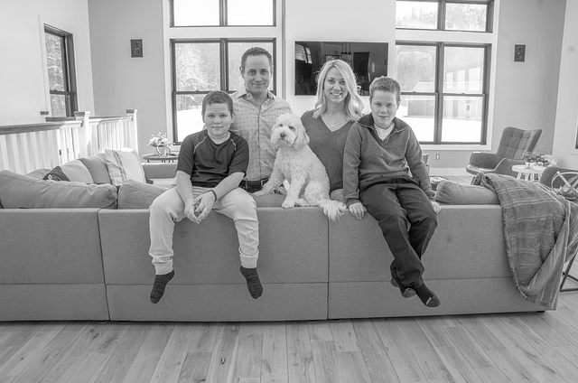 Two boys, mom and dad with dog